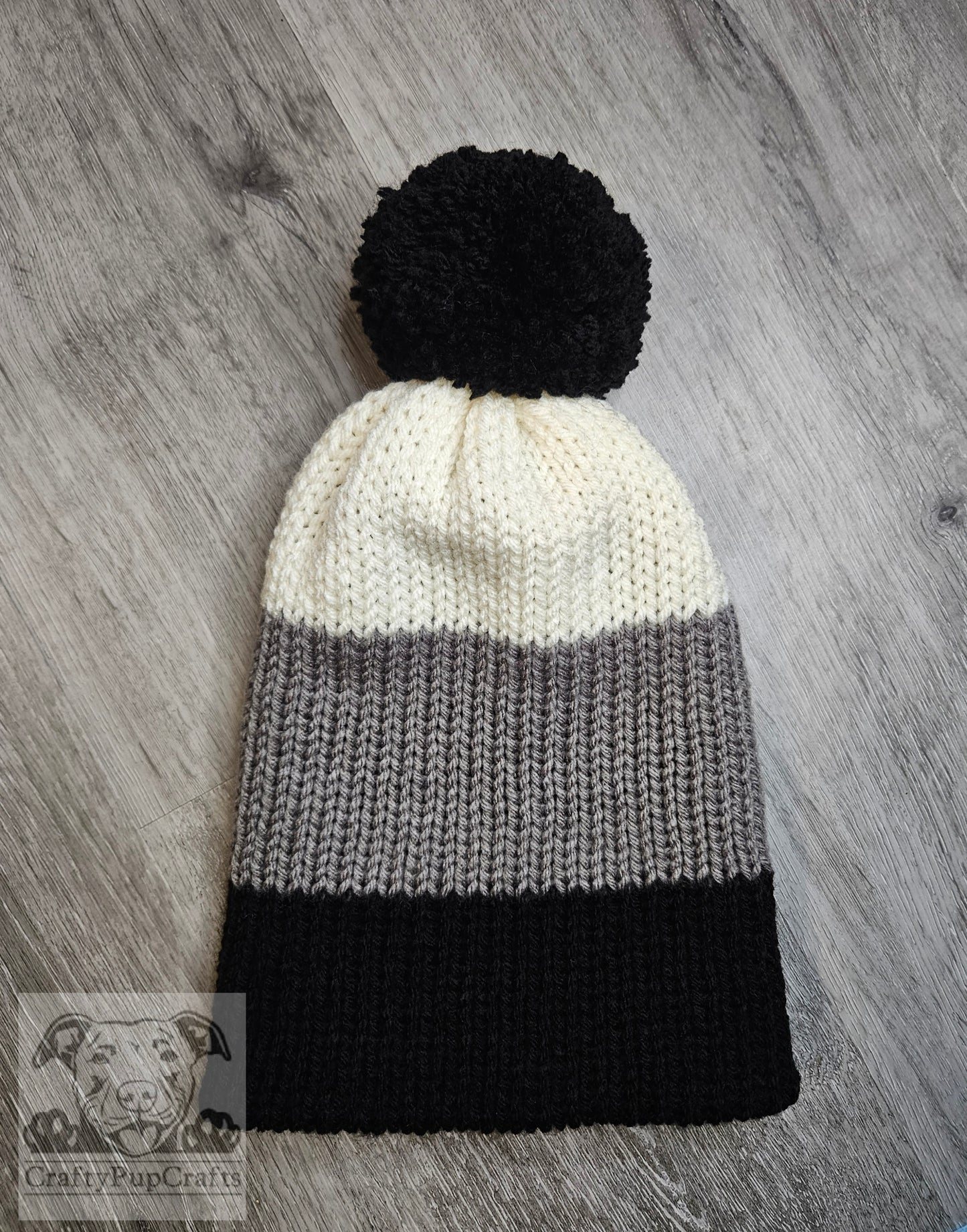 Black, gray, & ivory knit faux brim beanie with pom pom