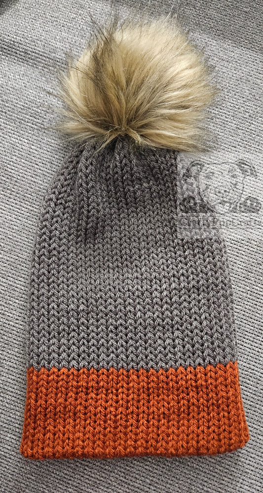 Gray & orange knit faux brim beanie with faux fur pom pom