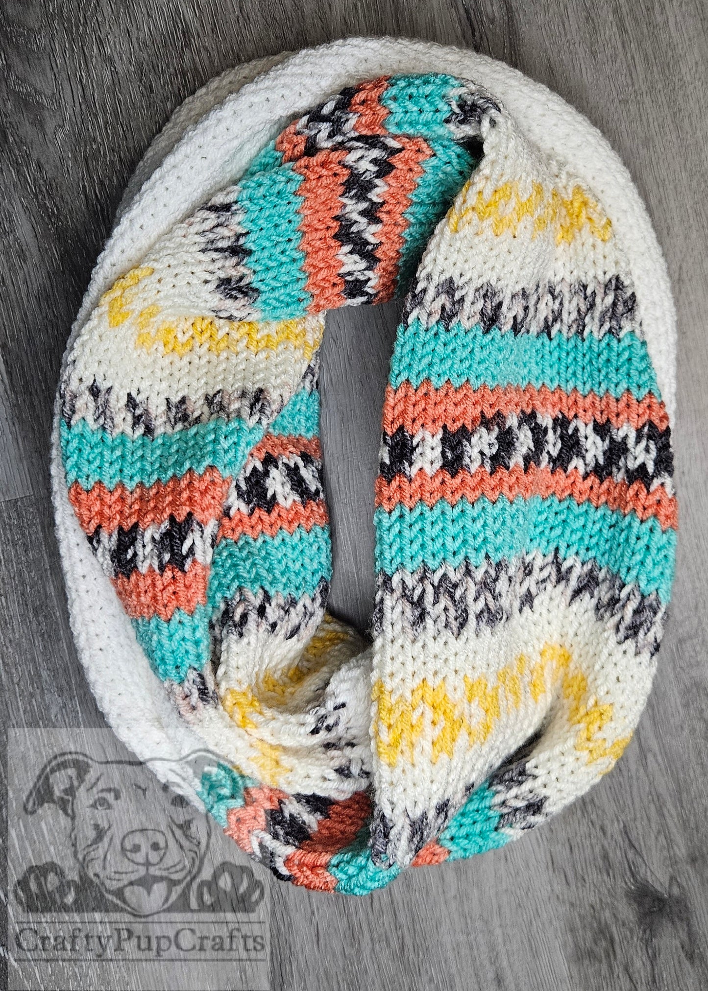 White, peach, teal, yellow, and black infinity scarf